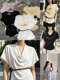 Women's satin cowl neck draped top with braided rope belt in 5 colours — purple, oat beige, lemon yellow, black and white — on hangers and modelled outdoors