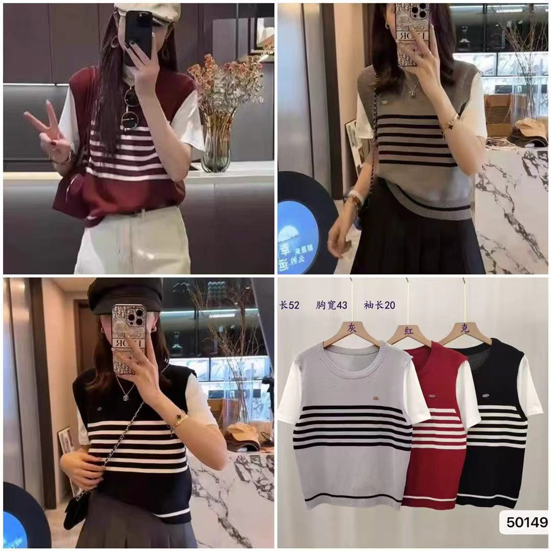 Women's layered look striped knitted top with faux vest and white sleeves shown in grey, red and black