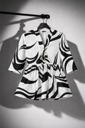 Abstract Swirl Print Peplum Tunic Top | V-Neck Gold Button Women's Top | Miss Kapachi