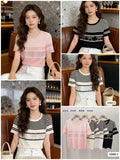 Women's striped knitted top with embellished bow chest panel shown in blush pink, cream apricot, white and black