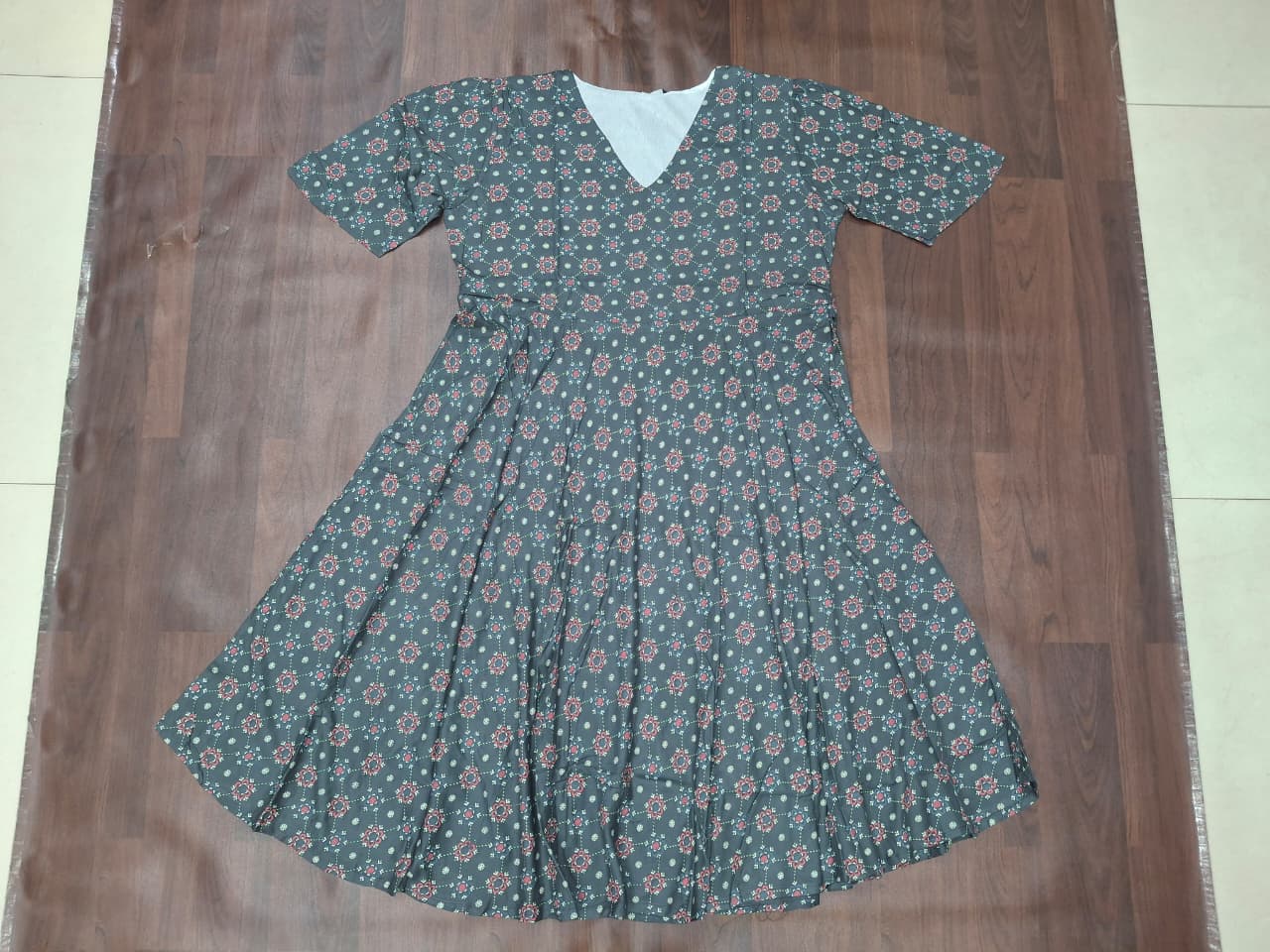 Women's V-neck floral block print fit-and-flare midi dress in sage green by Miss Kapachi