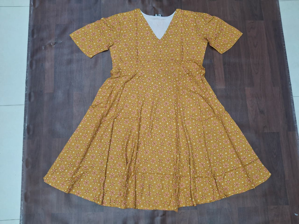 Women's V-neck floral block print fit-and-flare midi dress in mustard yellow by Miss Kapachi