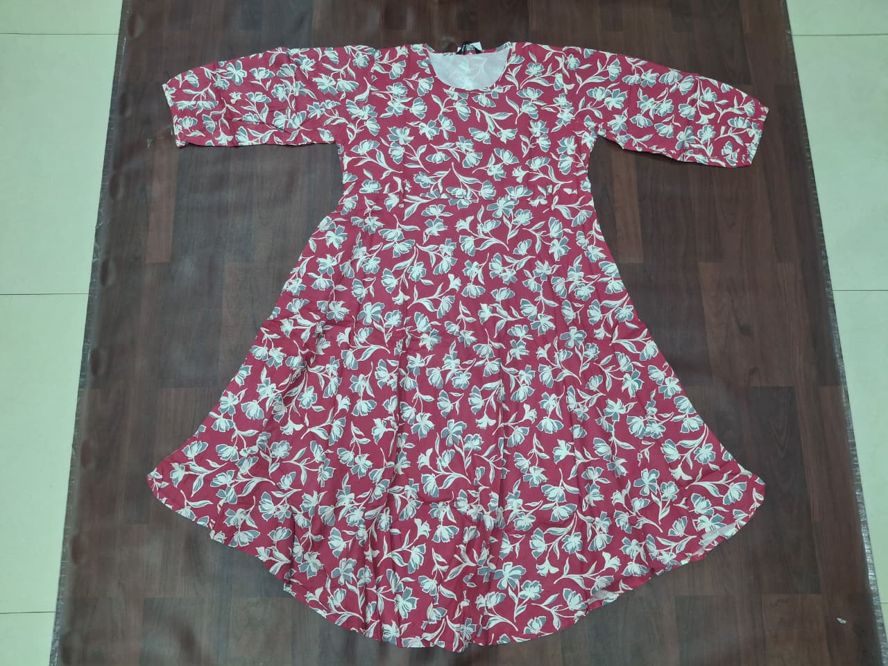 Women's round neck 3/4 sleeve floral print fit-and-flare midi dress in teal blue by Miss Kapachi