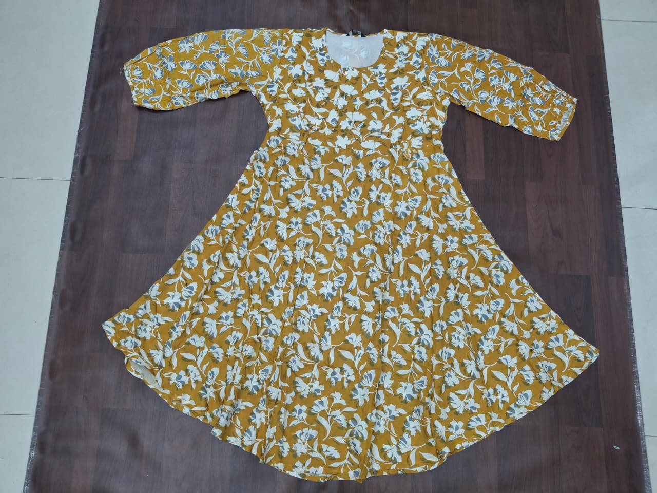 Women's round neck 3/4 sleeve floral print fit-and-flare midi dress in lime green by Miss Kapachi