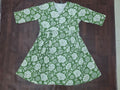Women's 3/4 sleeve surplice V-neck floral print fit-and-flare midi dress in olive green by Zero+1