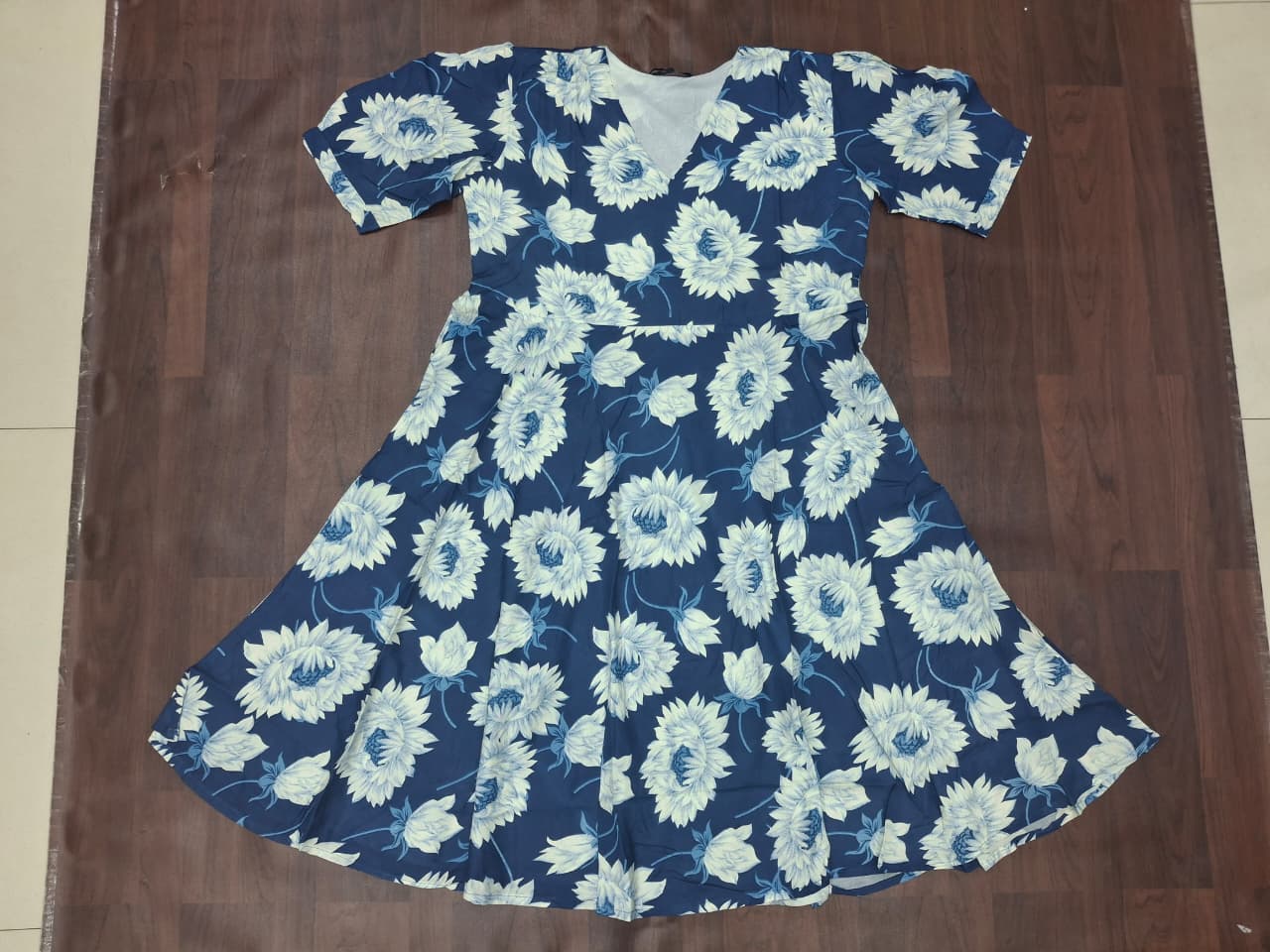 Women's V-neck short sleeve sunflower print fit-and-flare skater midi dress in navy blue by Zero+1