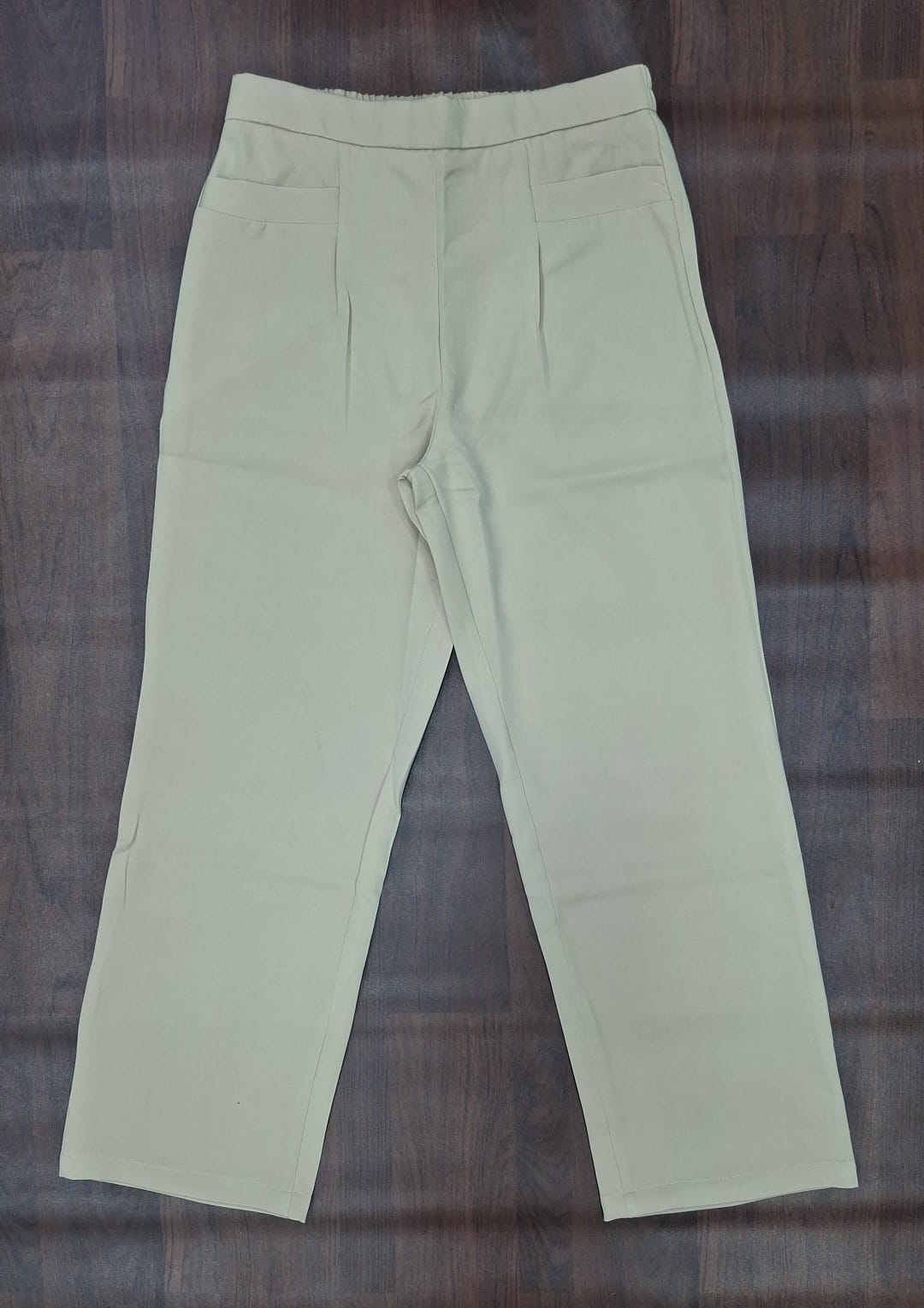 Beige straight-leg trousers with front pockets