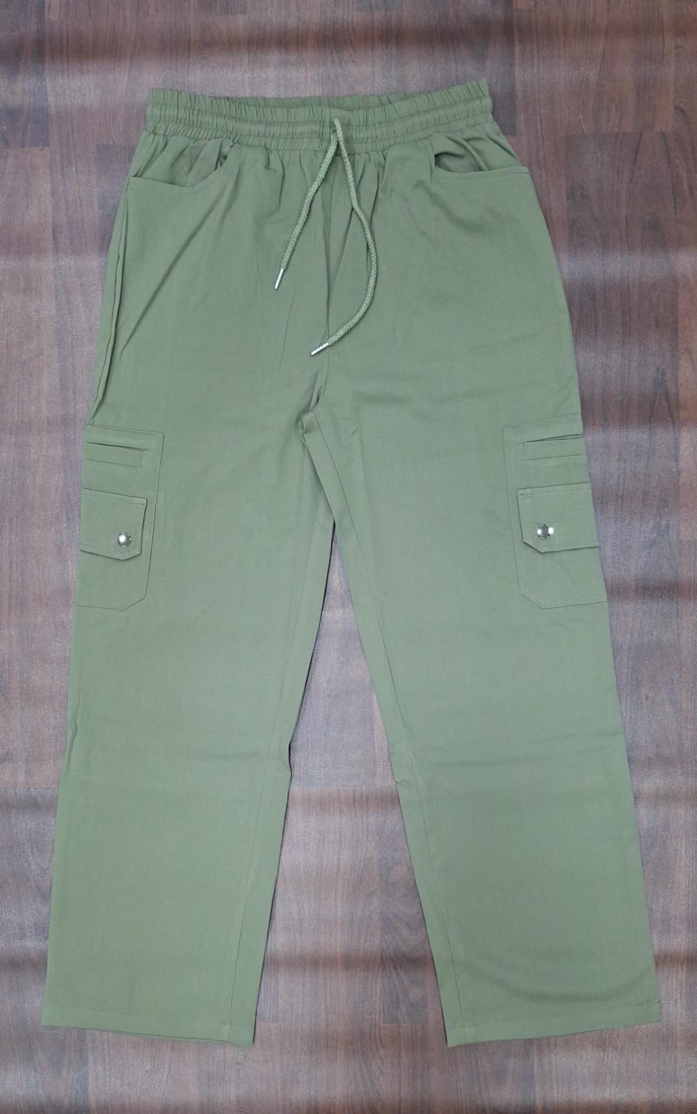 Light grey cargo pants with front pockets and flap cargo pockets