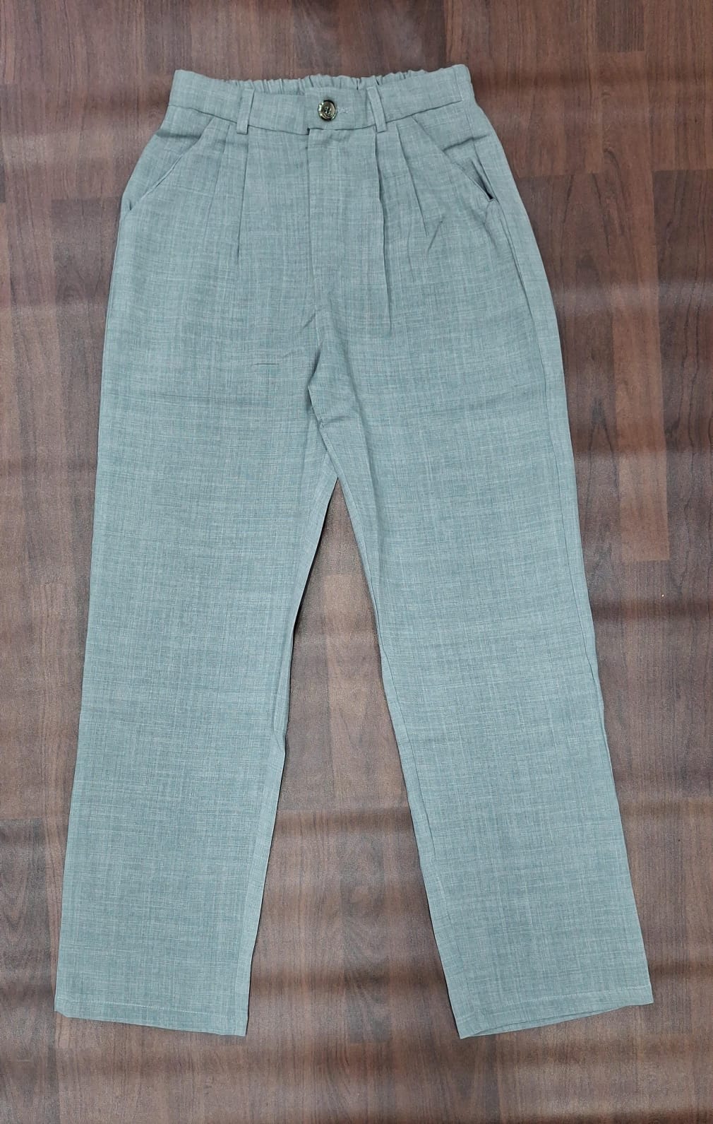 White straight-leg trousers with front pleats and angled pockets