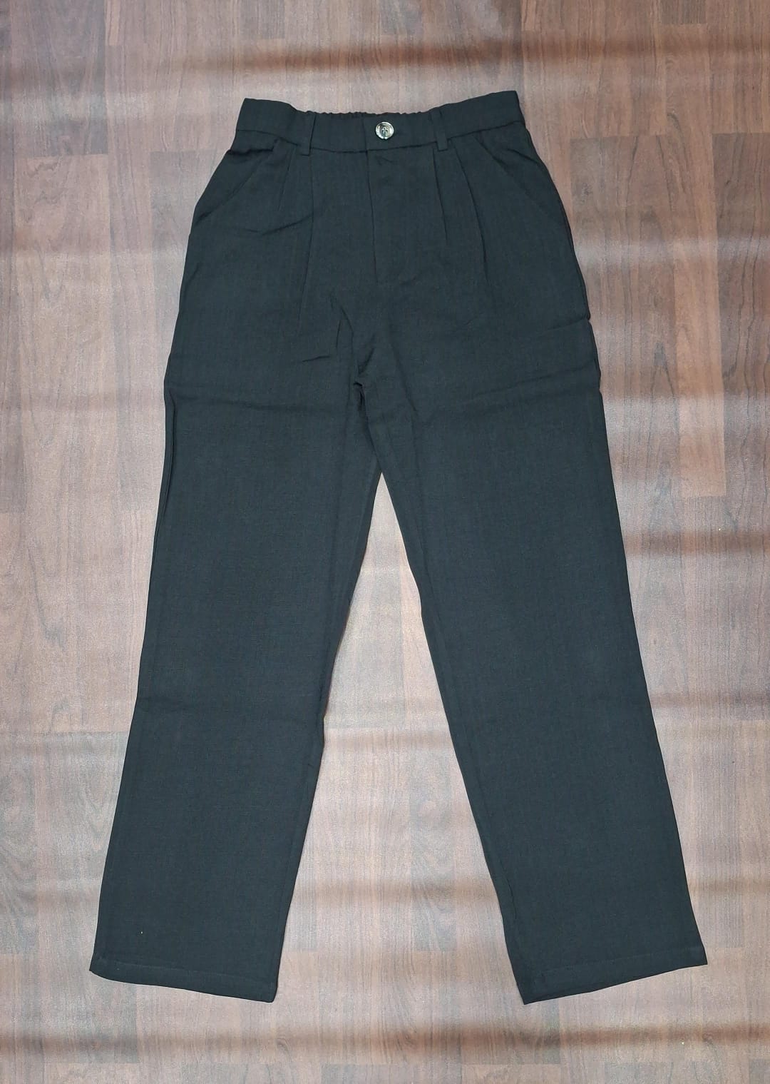 Black textured straight-leg trousers with a tailored waistband