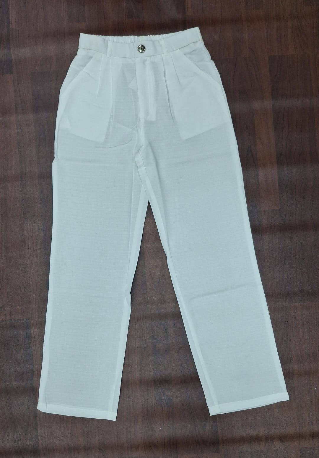 Ivory straight-leg trousers with belt loops and front pockets