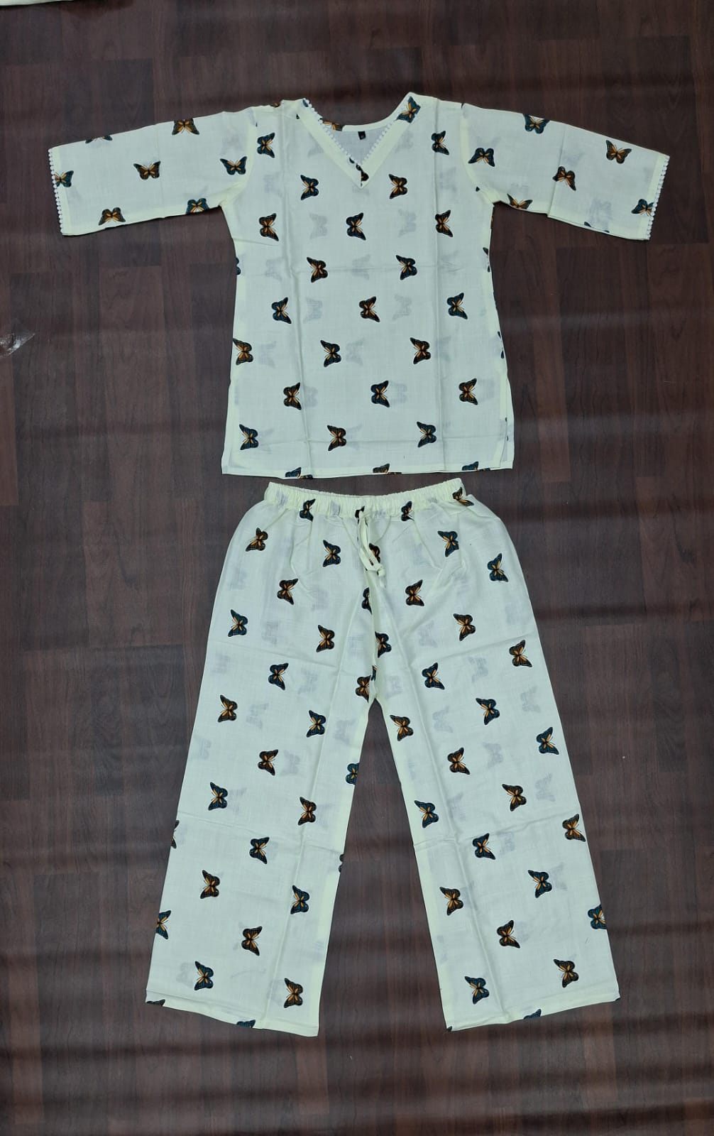 Pale mint butterfly print two-piece lounge set with matching top and pants