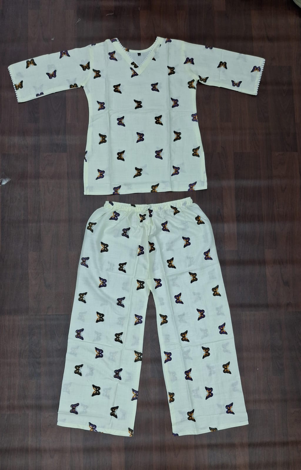 Pale blue butterfly print co-ord set with relaxed top and elasticated waist pants