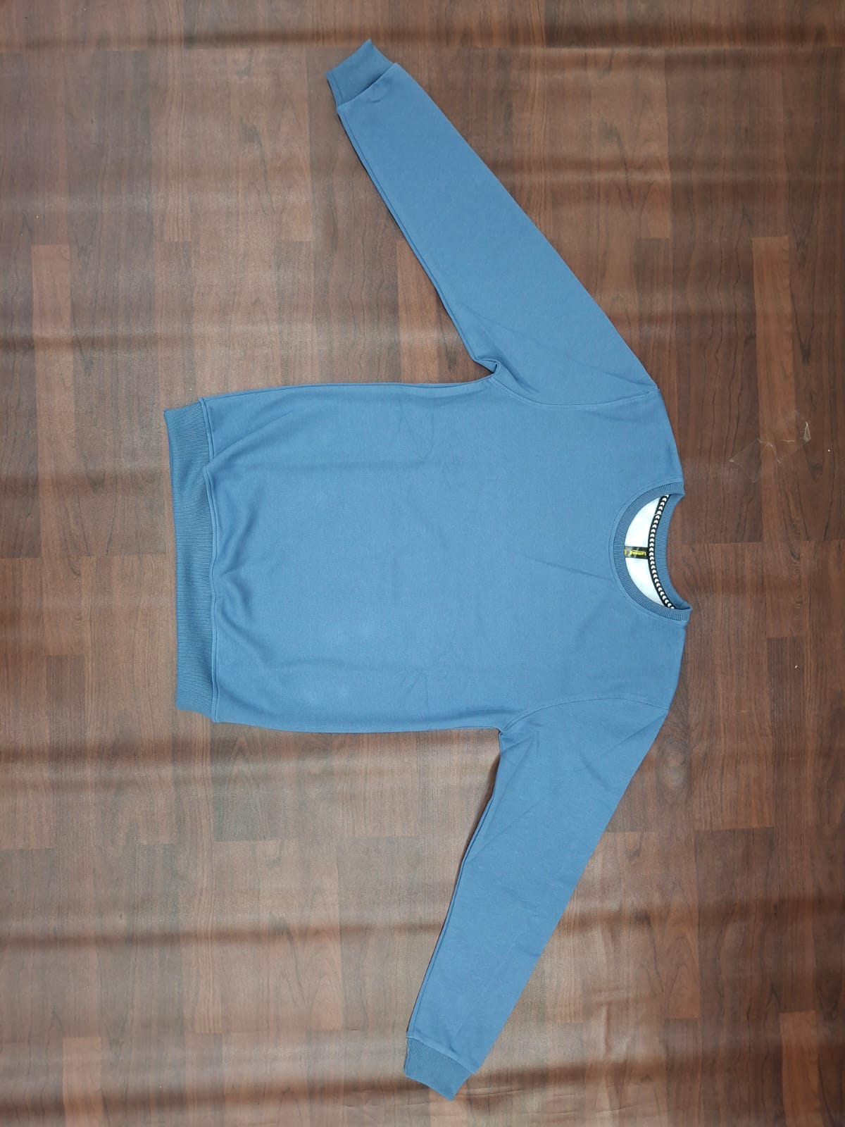 Blush pink full-sleeve round-neck sweatshirt with contrast striped neckline detail