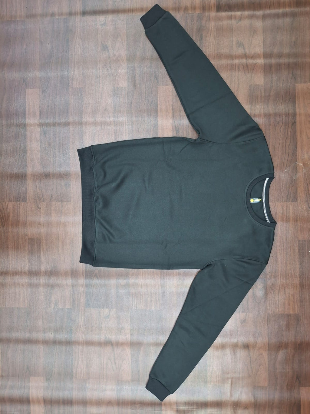 Mint green full-sleeve round-neck sweatshirt with contrast striped neckline detail