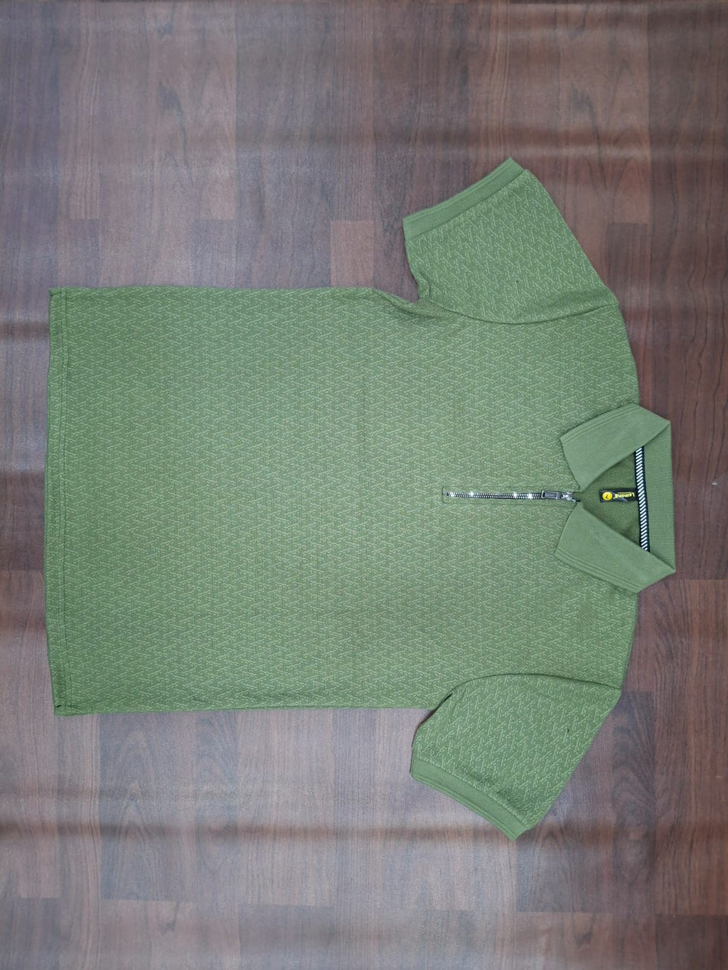 Black textured half-sleeve zip polo shirt with stand collar and front half-zip