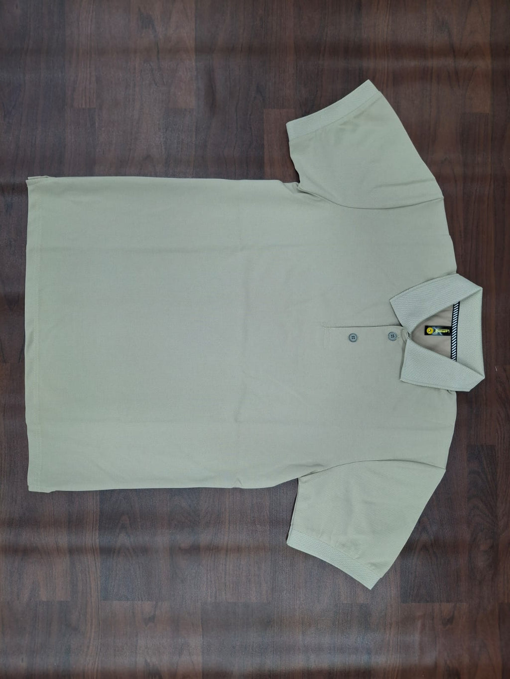 Light blue solid half-sleeve polo T-shirt with structured collar, two-button placket, and contrast trim